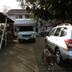 Front view- had to move all the cars around and dismantle the gate just to pull it in.